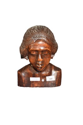 Lot 340 - Carved wooden bust of a young girl, 28cm high