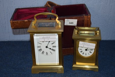 Lot 345 - A carriage clock in case together with a...