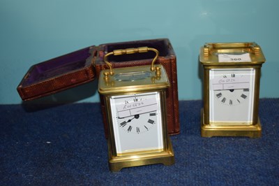 Lot 360 - Two further brass carriage clocks, one with case