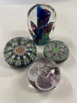 Lot 400A - Victorian dump paperweight together with three...