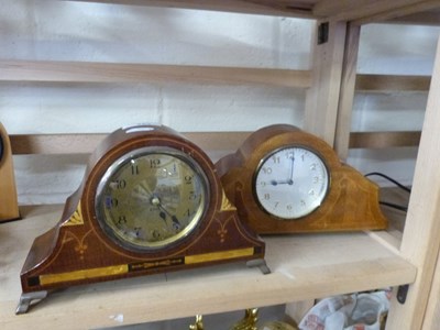 Lot 582 - Two small arch top mantel clocks in mahogany...