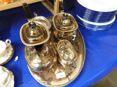 Lot 585 - A four piece silver plated tea set and...