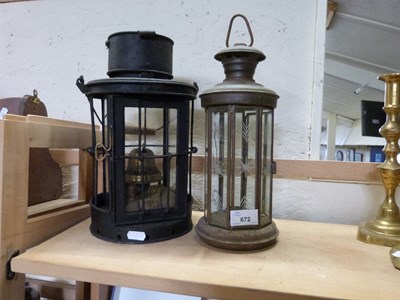 Lot 672 - A vintage parafin lantern and one other