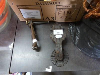 Lot 691 - Two vintage door knockers