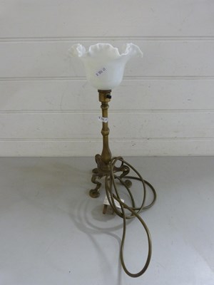 Lot 23 - Brass stirrup type table lamp with frilled...