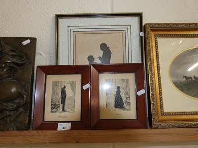 Lot 44 - Pair of small silhouette portraits in stained...