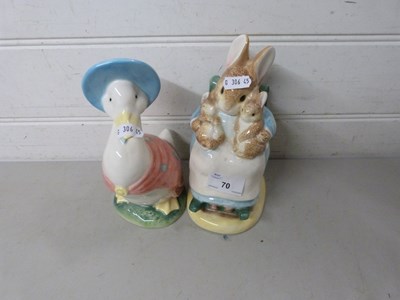 Lot 70 - Two  modern Beatrix Potter money boxes