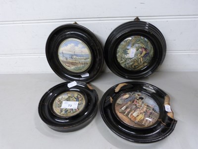 Lot 73 - Four Pratt ware pot lids in ebonised frames