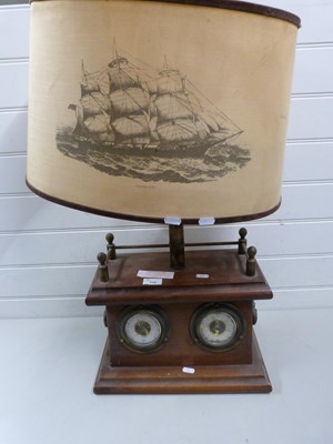 Lot 132 - Unusual combination table lamp with barometer...