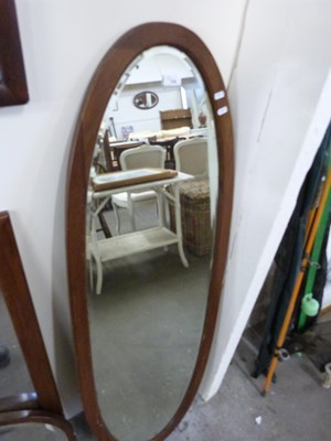 Lot 729 - Large oval bevelled wall mirror in hardwood frame