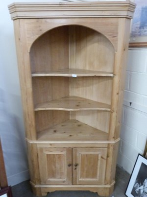 Lot 750 - Waxed pine corner cabinet with base cupboard