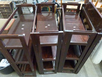 Lot 825 - Four dark stained folding bookcases