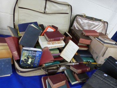 Lot 842 - Two suitcases various assorted books