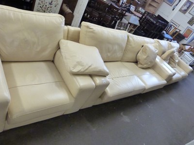 Lot 874 - Modern cream leather three seater sofa with...