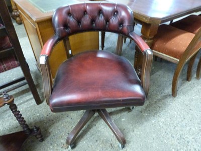 Lot 288 - Red leather upholstered captains chair