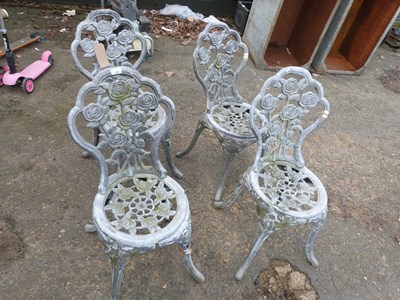 Lot 359 - Set of four cast aluminium garden chairs