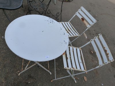 Lot 361 - White finish metal garden table and two chairs