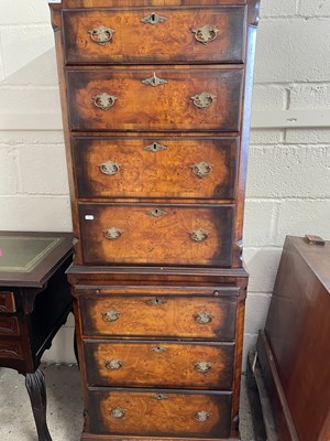 Lot 621 - Reproduction walnut veneered chest on chest...