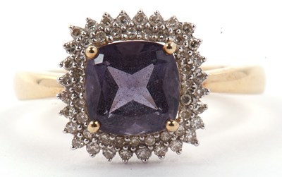 Lot 12 - Modern 9ct gold iolite and small diamond...