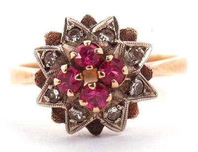 Lot 18 - Ruby and diamond cluster ring the centre with...