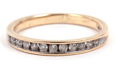 Lot 27 - Modern diamond half eternity ring chanel set...