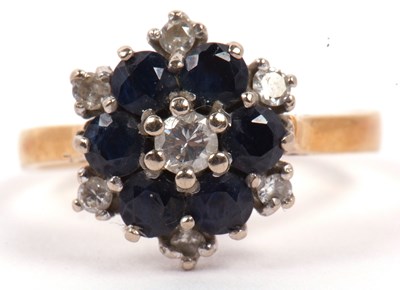 Lot 31 - Sapphire and diamond cluster ring, a flower...