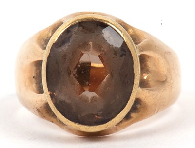 Lot 36 - Antique smokey quartz ring, the oval faceted...