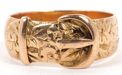 Lot 42 - An antique 18ct gold buckle ring, with chased...