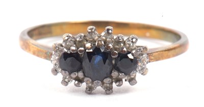 Lot 60 - 9ct gold sapphire and diamond ring featuring...