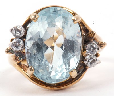 Lot 65 - Large Topaz and paste set dress ring, the...