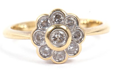 Lot 68 - 18ct diamond cluster ring featuring nine round...