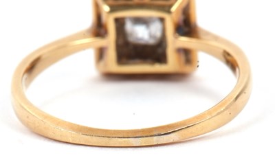 Lot 69 - An Art Deco diamond ring the square cut centre...