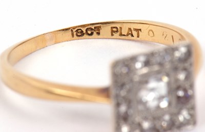 Lot 69 - An Art Deco diamond ring the square cut centre...