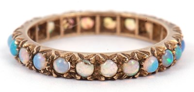 Lot 80 - A vintage opal set full eternity ring...