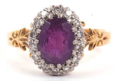 Lot 95 - A modern amethyst and diamond cluster ring,...