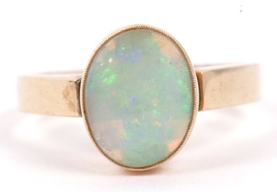 Lot 106 - A single stone opal ring, cabochon cut and set...