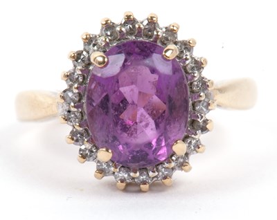 Lot 107 - A 9ct gold amethyst and diamond cluster ring,...