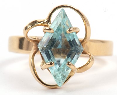 Lot 119 - A modern designer ring featuring a light blue...