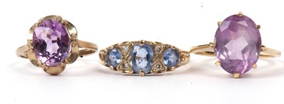 Lot 146 - A group of three 9ct gold stone set rings, g/w...