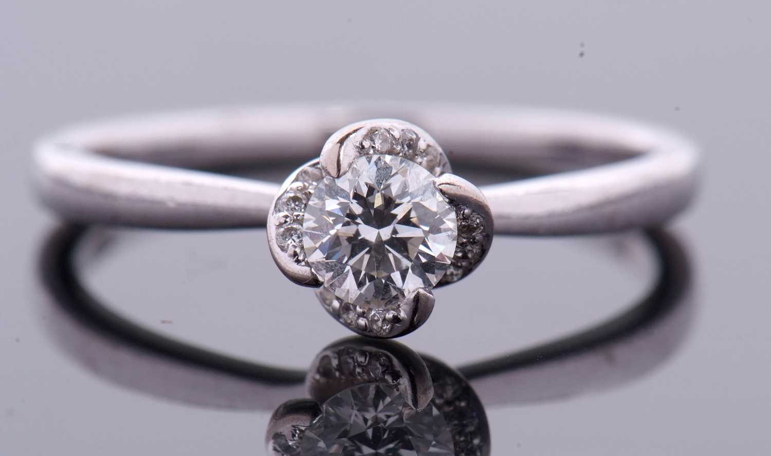 Lot 12 - A maple leaf diamonds "Wind Embrace" 18ct...