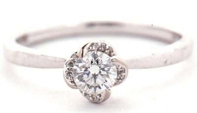 Lot 12 - A maple leaf diamonds "Wind Embrace" 18ct...