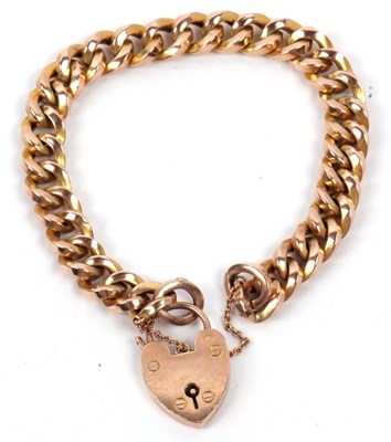 Lot 170 - A 9ct gold curb link bracelet with heart...