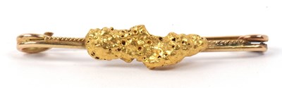 Lot 173 - A pin brooch applied with a high grade yellow...