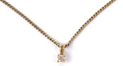 Lot 174 - A small diamond pendant featuring an old cut...