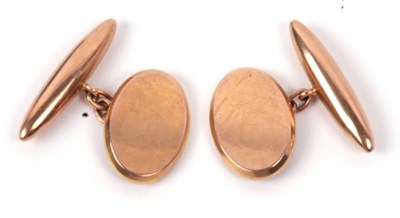 Lot 181 - A pair of 9ct gold cufflinks, the oval plain...