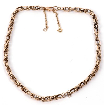 Lot 187 - A yellow metal chain (repaired) tested for 9ct...