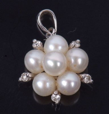 Lot 213 - A small precious metal seed pearl and diamond...