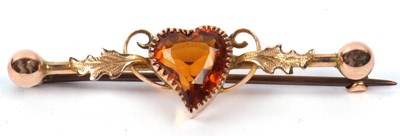 Lot 216 - A vintage citrine set brooch, the heart shaped...