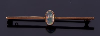 Lot 218 - A vintage opal brooch, the oval cabochon stone...