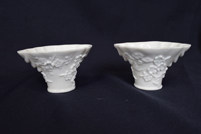 Lot 13 - Pair of Chinese porcelain libation cups with...